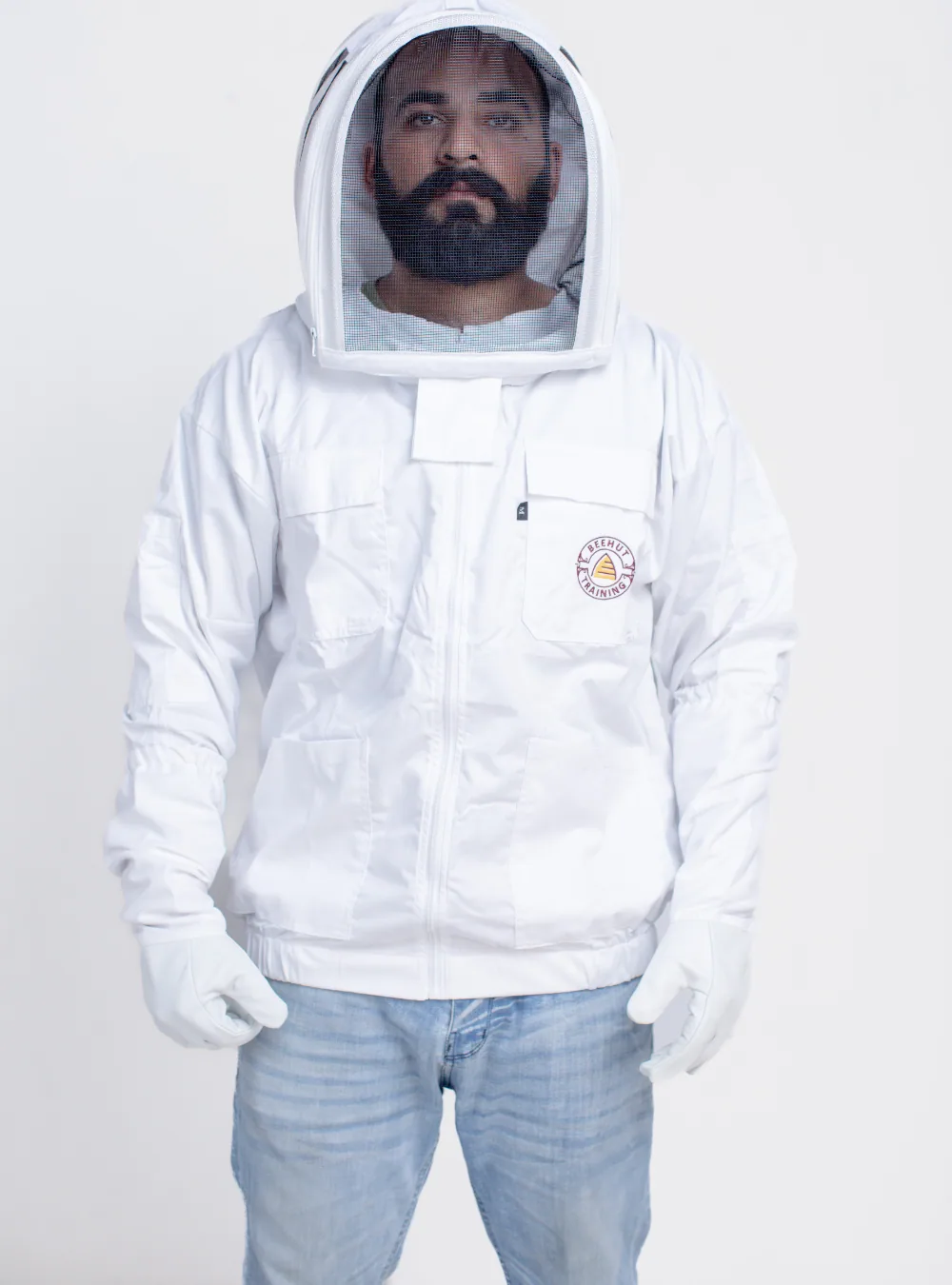 A beekeeping jacket with elasticated cuffs, the arrangement that cannot be left undone