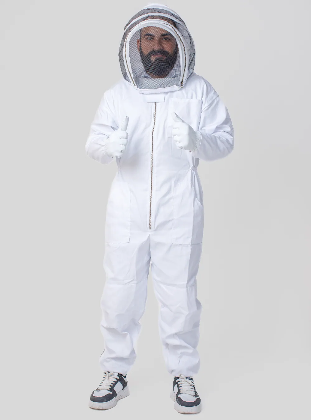 Women's bee suit sizing starts at the chest, but the shoulder seam is the measurement that decides cuff coverage